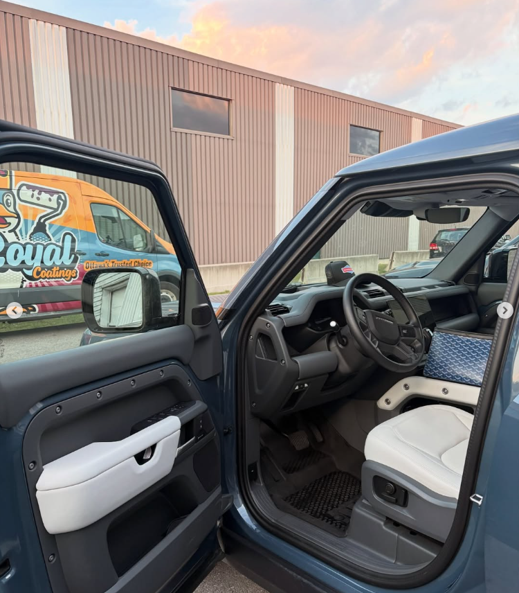 Land Rover Defender white leather interior with tinted windows