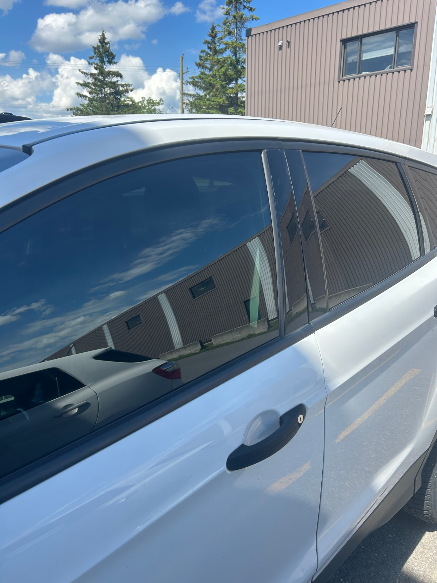Ceramic tint — driver side on a SUV in Ottawa