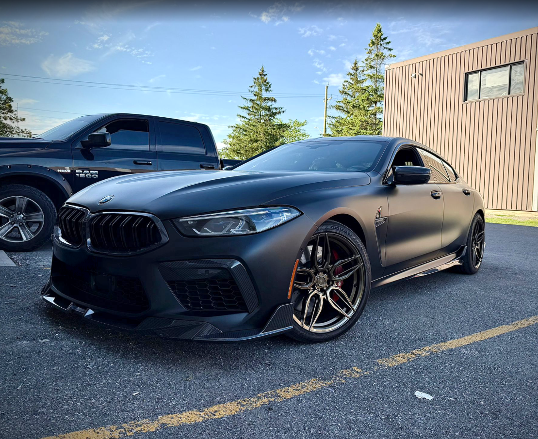 Matte black BMW M8 Competition with carbon fibre lip by AutoWa Customs
