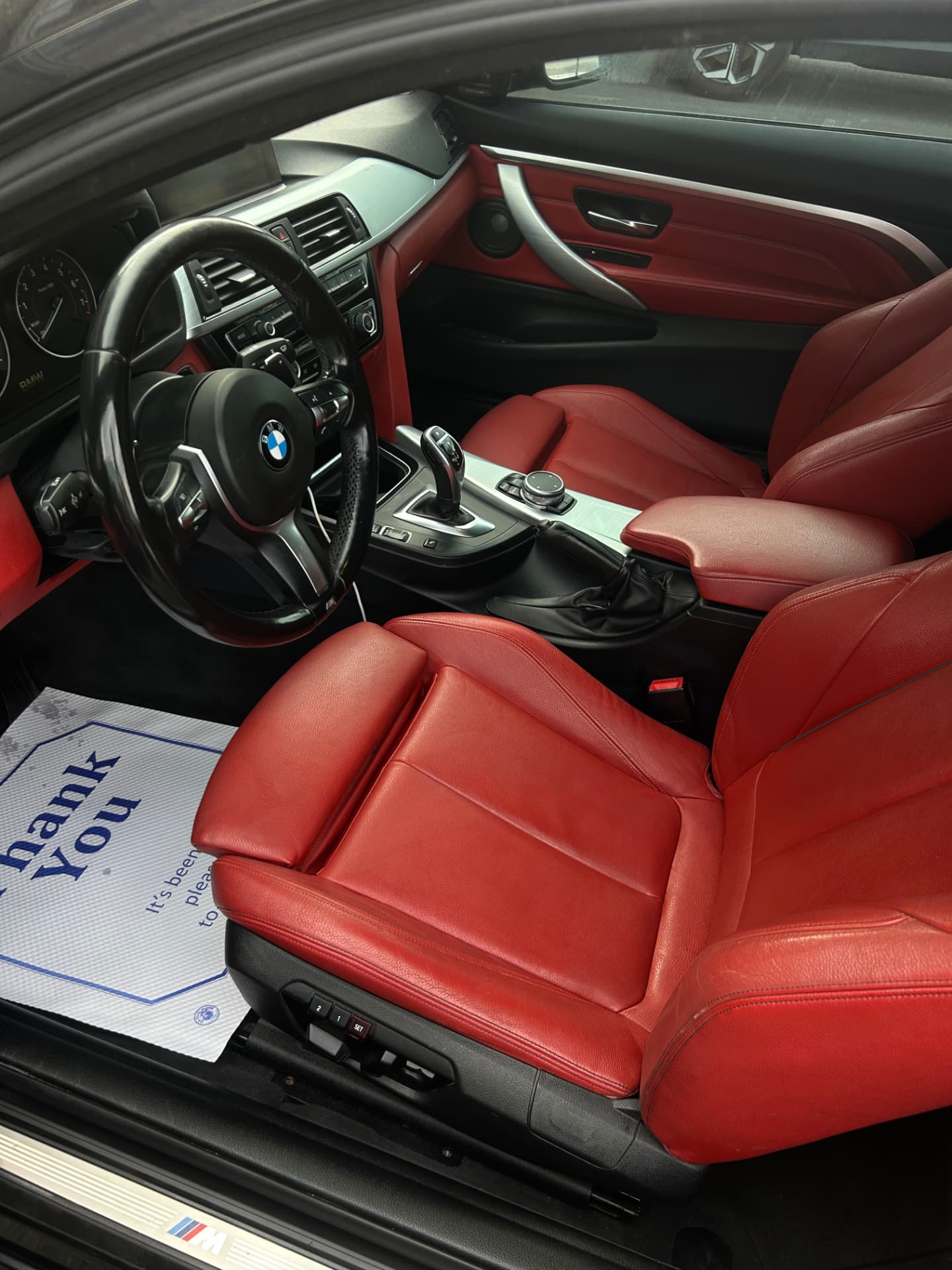 Red leather interior detail on a BMW 4 Series in Ottawa