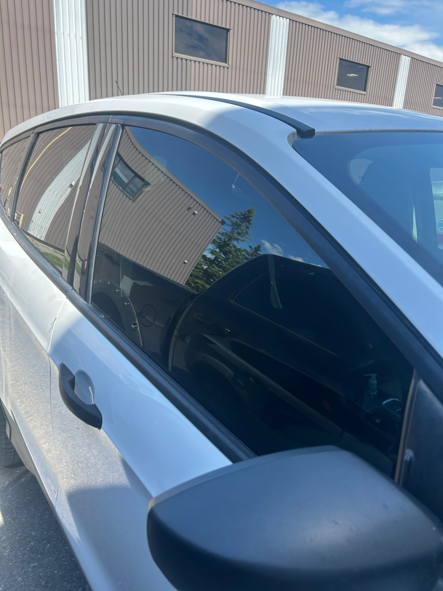 Ceramic tint — passenger side on a SUV in Ottawa